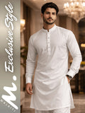 Man wearing a white kurta in an indoor setting with walaiti Exclusive Style' branding.
